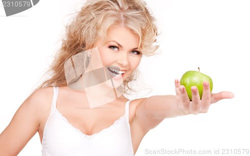 Image of young beautiful woman with green apple