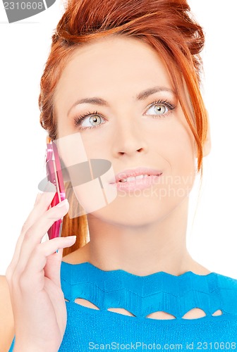 Image of happy woman with pink phone