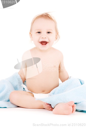 Image of baby with blue towel