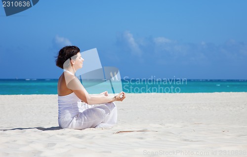 Image of meditation on the beach