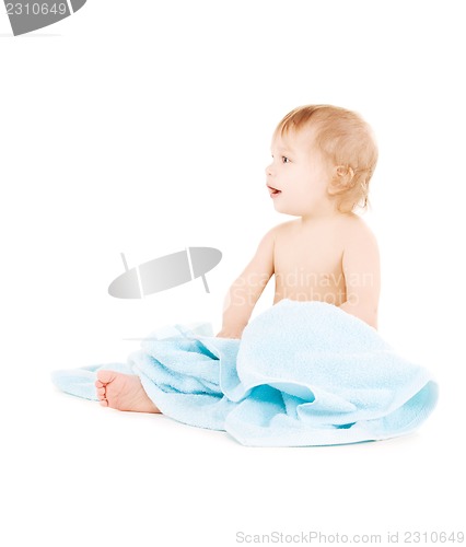 Image of baby with blue towel