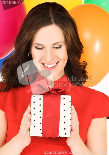 Image of happy woman with gift box