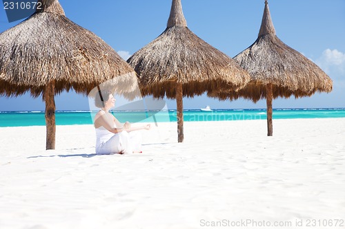 Image of meditation on the beach