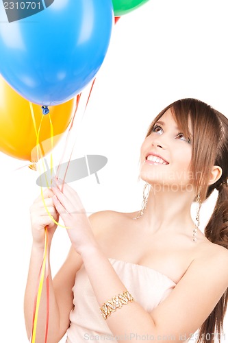Image of happy teenage girl with balloons