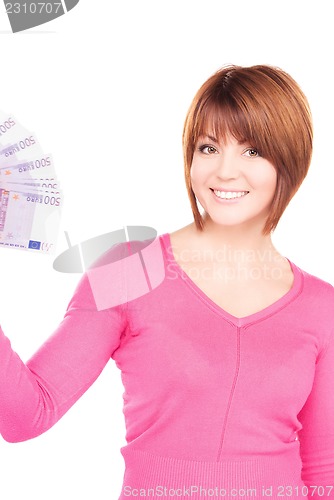 Image of happy woman with money