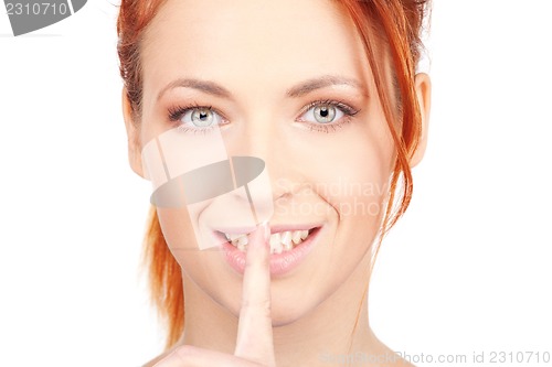 Image of finger on lips
