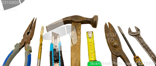 Image of different retro construction work tools on white 