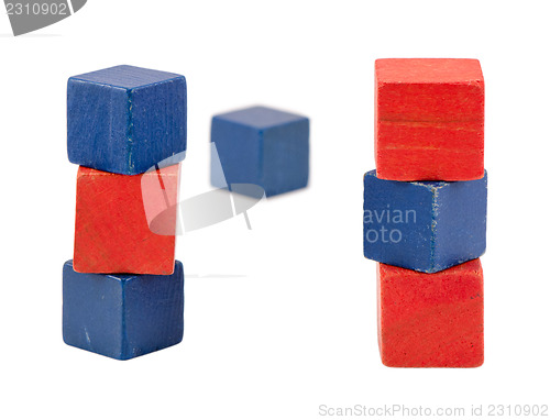 Image of red blue color toy log blocks stand on white 