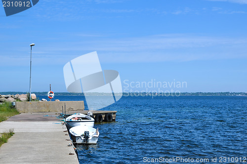 Image of Small boats at pier