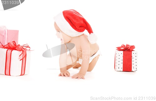 Image of santa helper baby with christmas gifts