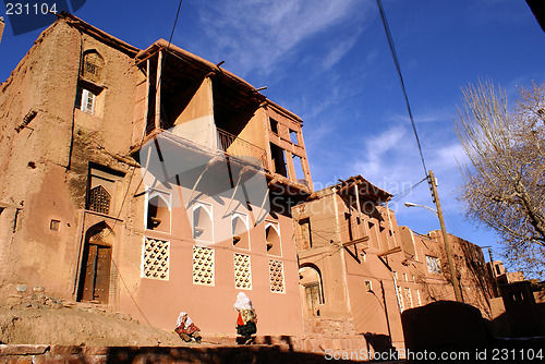 Image of Two women near the building