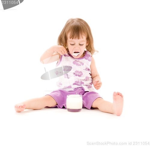 Image of little girl with yogurt