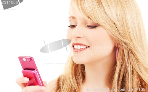 Image of happy teenage girl with cell phone