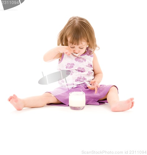 Image of little girl with yogurt