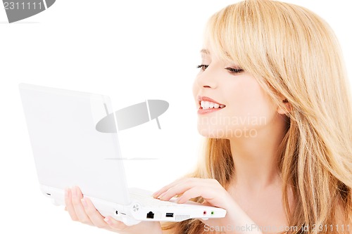 Image of teenage girl with laptop computer