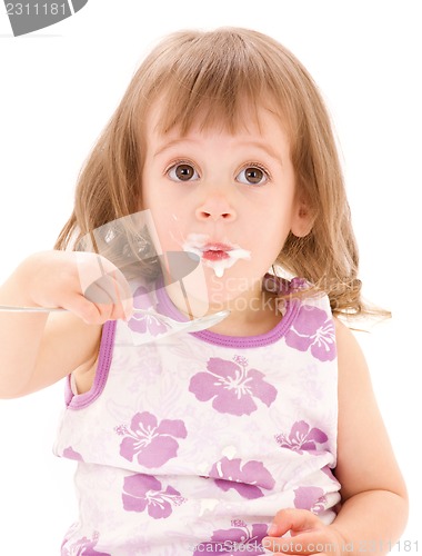 Image of little girl with yogurt