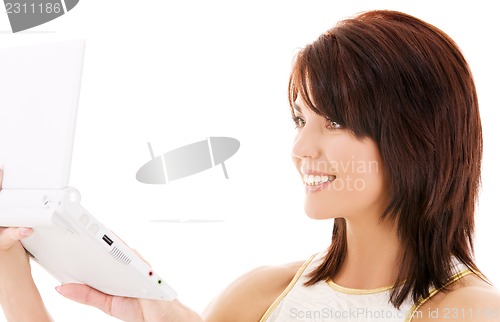 Image of happy woman with laptop computer