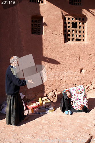 Image of Man and woman near the house