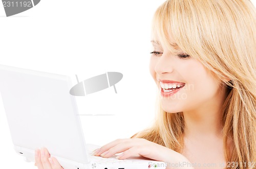 Image of teenage girl with laptop computer