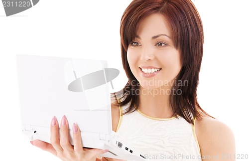 Image of happy woman with laptop computer