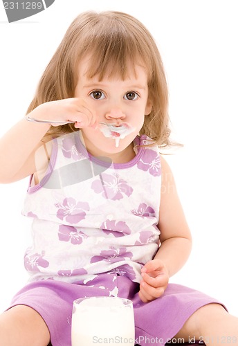Image of little girl with yogurt