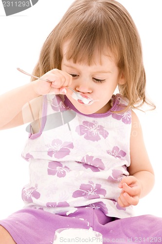 Image of little girl with yogurt