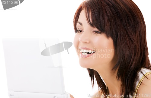 Image of happy woman with laptop computer