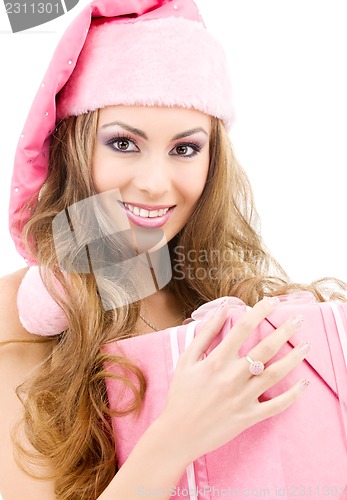 Image of happy santa helper with gift box