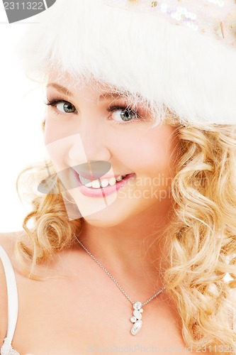 Image of cheerful santa helper girl