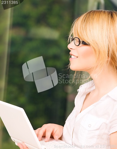 Image of office girl with laptop computer