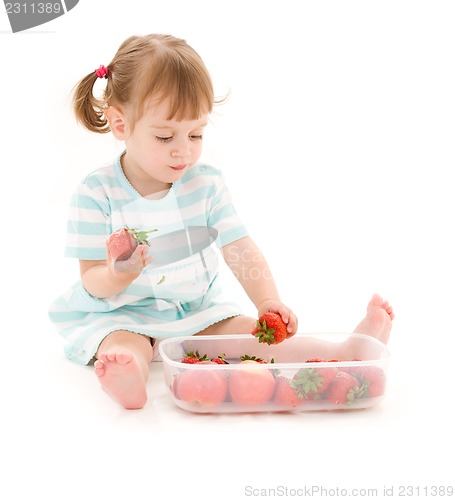 Image of little girl with strawberry