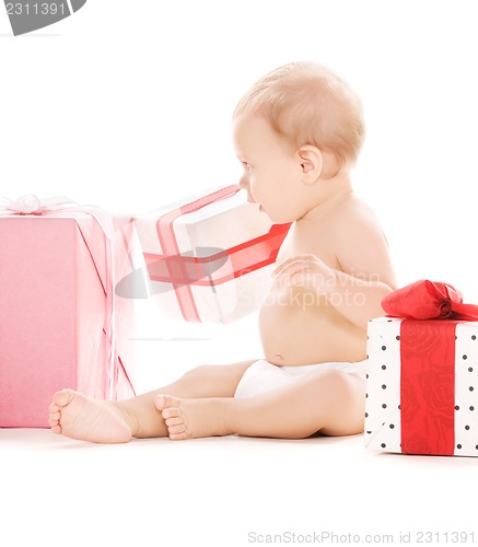 Image of baby boy with gifts