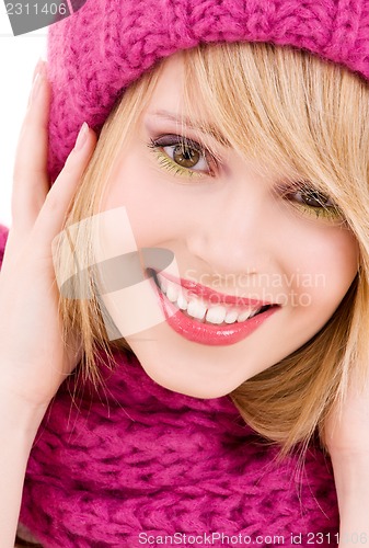 Image of happy teenage girl in hat