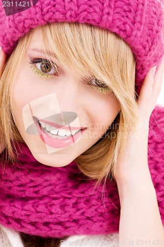 Image of happy teenage girl in hat