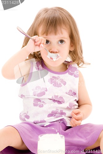 Image of little girl with yogurt