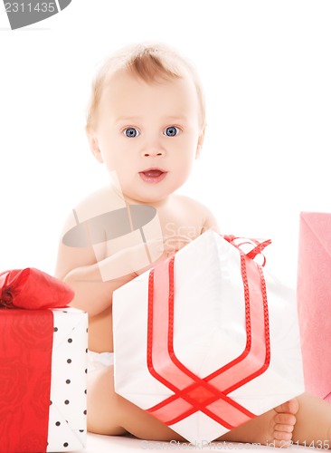 Image of baby boy with gifts