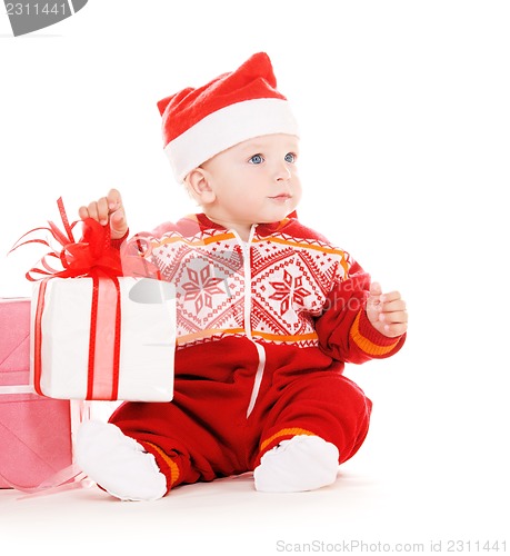 Image of santa helper baby with christmas gifts