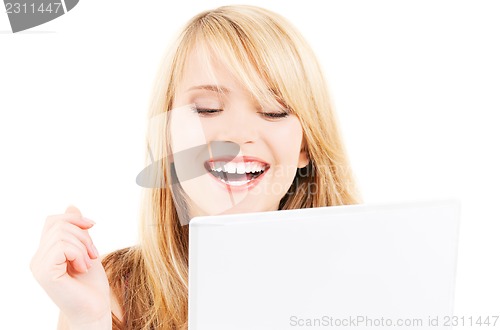 Image of teenage girl with laptop computer