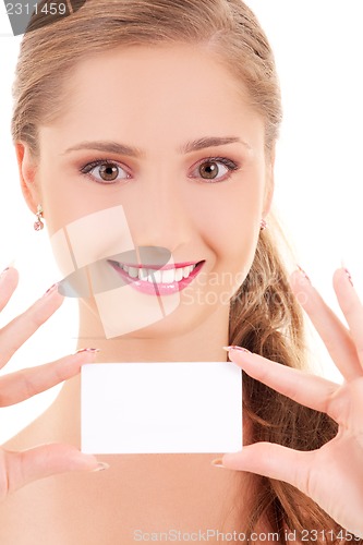 Image of happy girl with business card