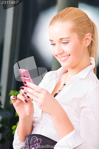 Image of lovely woman with cell phone