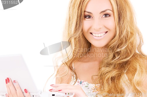 Image of happy woman with laptop computer