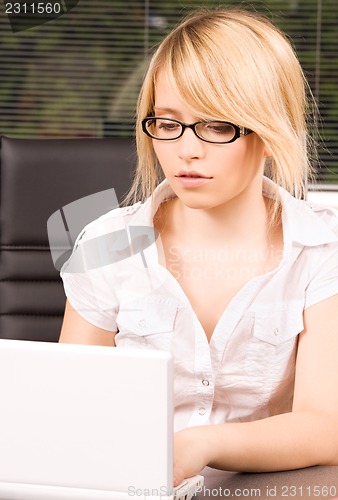 Image of office girl with laptop computer