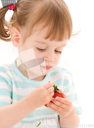 Image of little girl with strawberry