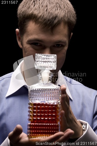 Image of man with a bottle