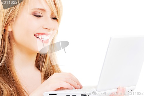 Image of teenage girl with laptop computer