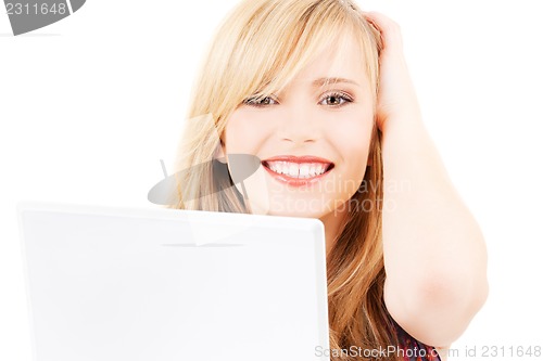 Image of teenage girl with laptop computer