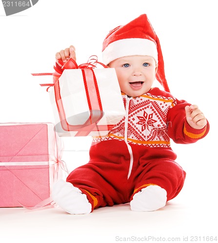 Image of santa helper baby with christmas gifts