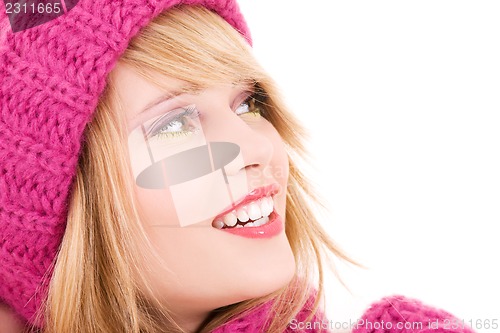 Image of happy teenage girl in hat