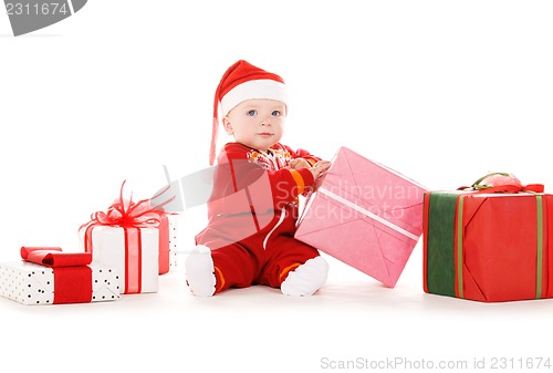 Image of santa helper baby with christmas gifts