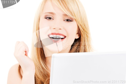 Image of teenage girl with laptop computer